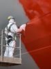 Reducing marine coating overspray using electrostatic application