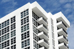 white apartment building aluminum