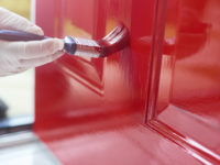 Homeowner gives his front door a new bold lick of paint