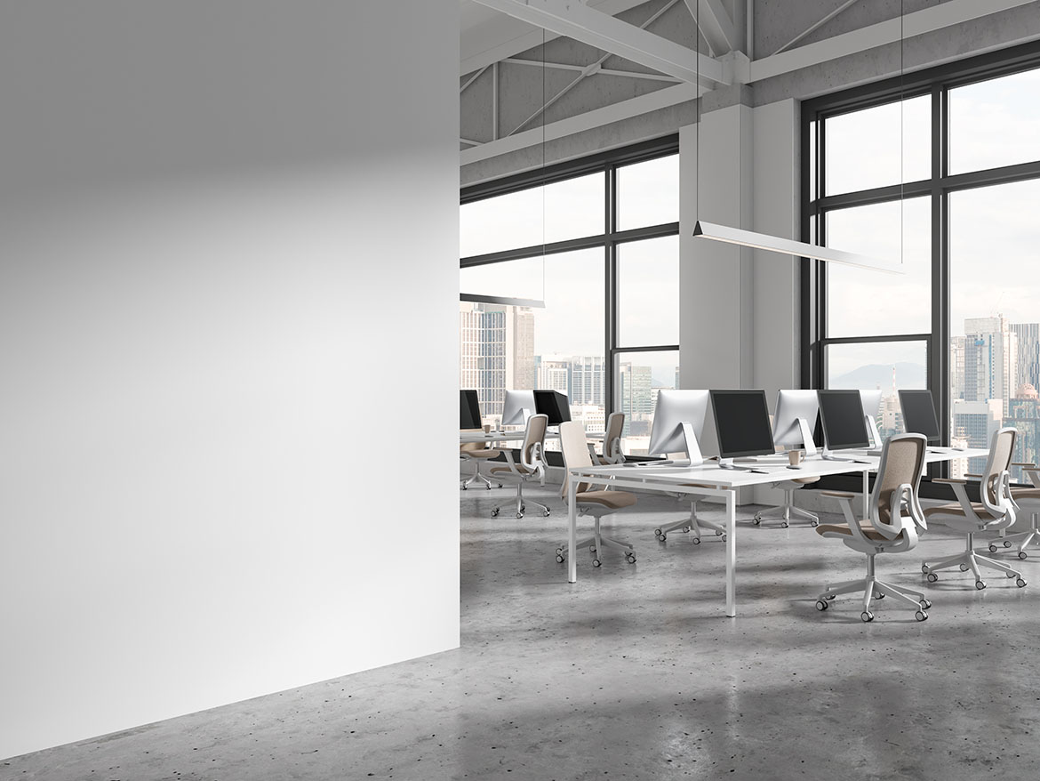 Stylish coworking interior with armchairs and pc computers on desk, panoramic window on Kuala Lumpur skyscrapers. Modern coworking corner and mock up empty wall partition. 3D rendering