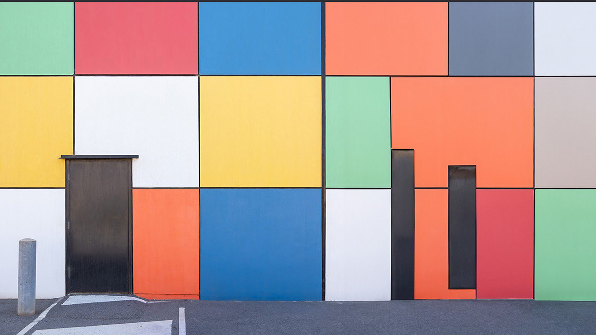 Exterior wall painted with blocks of vibrant colors