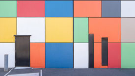 Exterior wall painted with blocks of vibrant colors