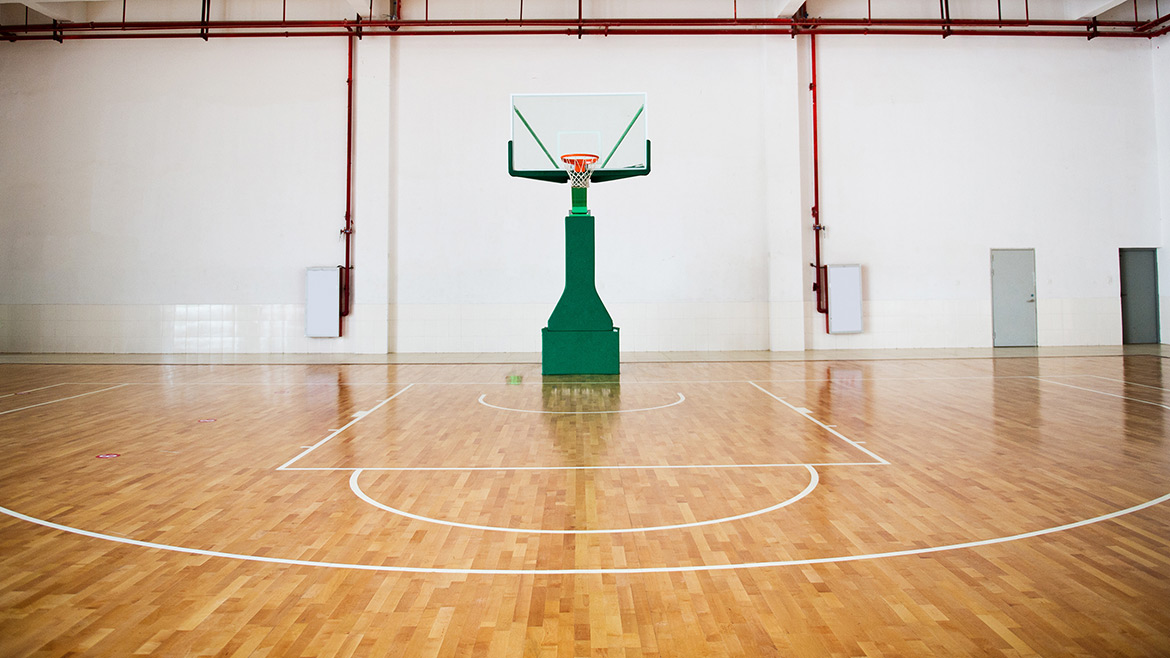 Wood gymnasium floor.