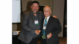 Photo of Bill Oney accepting the CCAI Lifetime Achievement award.