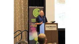 Photo of Jim-Gallagher doing a presentation at a CCAI event. 